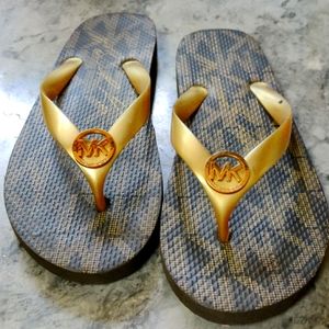 Michael Kors flip flops.